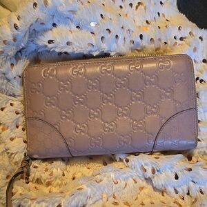 Gucci Pink Wallet with Embossed Logo Design